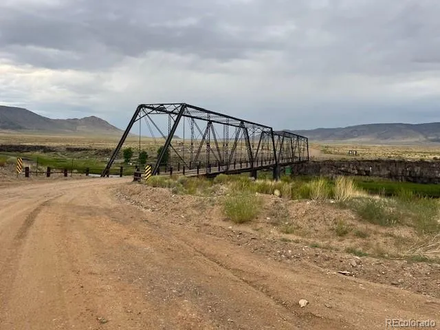 a view of a lake with a mountain in the background