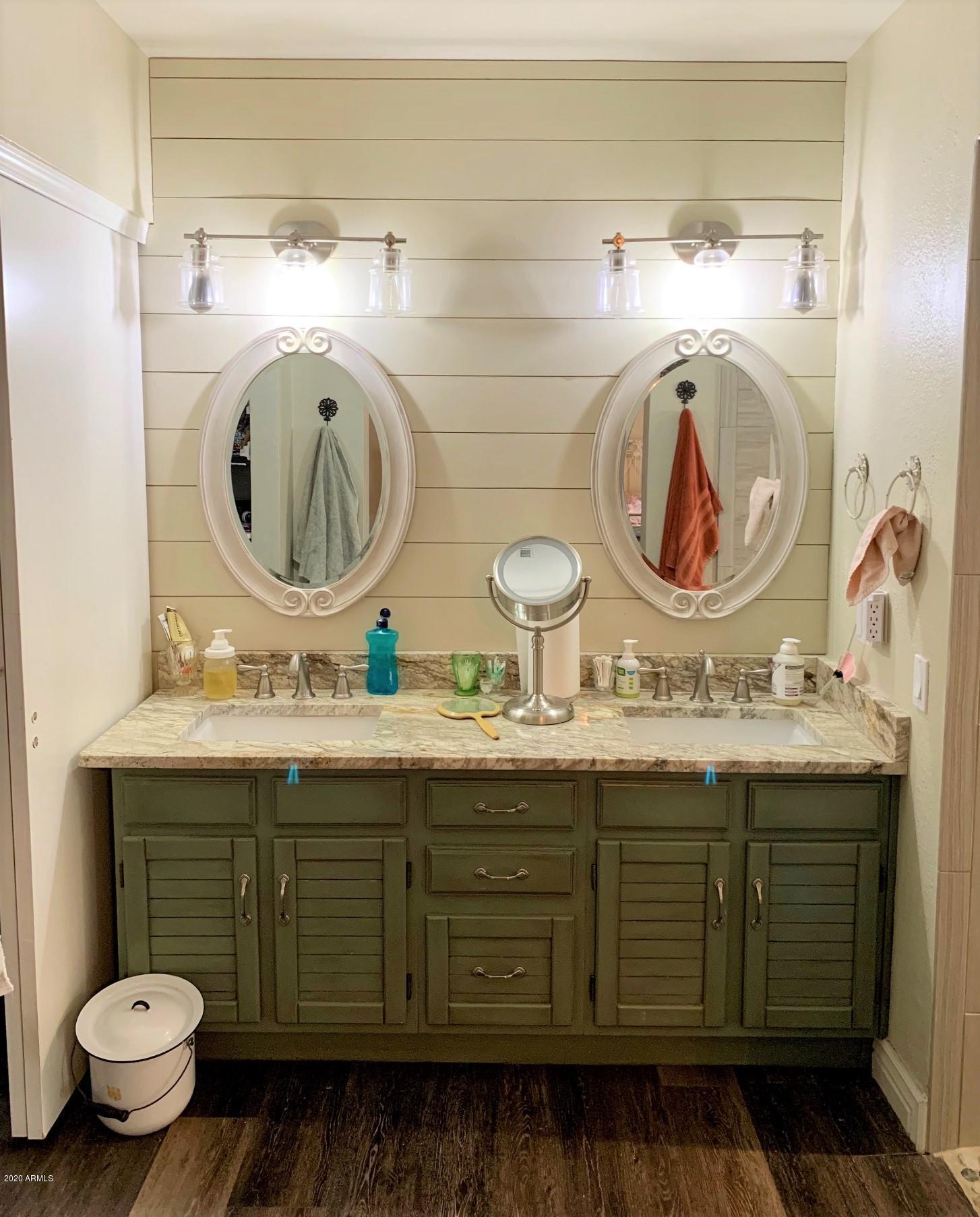 500 South Terrace Road Chandler, AZ 85226 - Photo 11 of 22 a bathroom with a granite countertop toilet sink and mirror