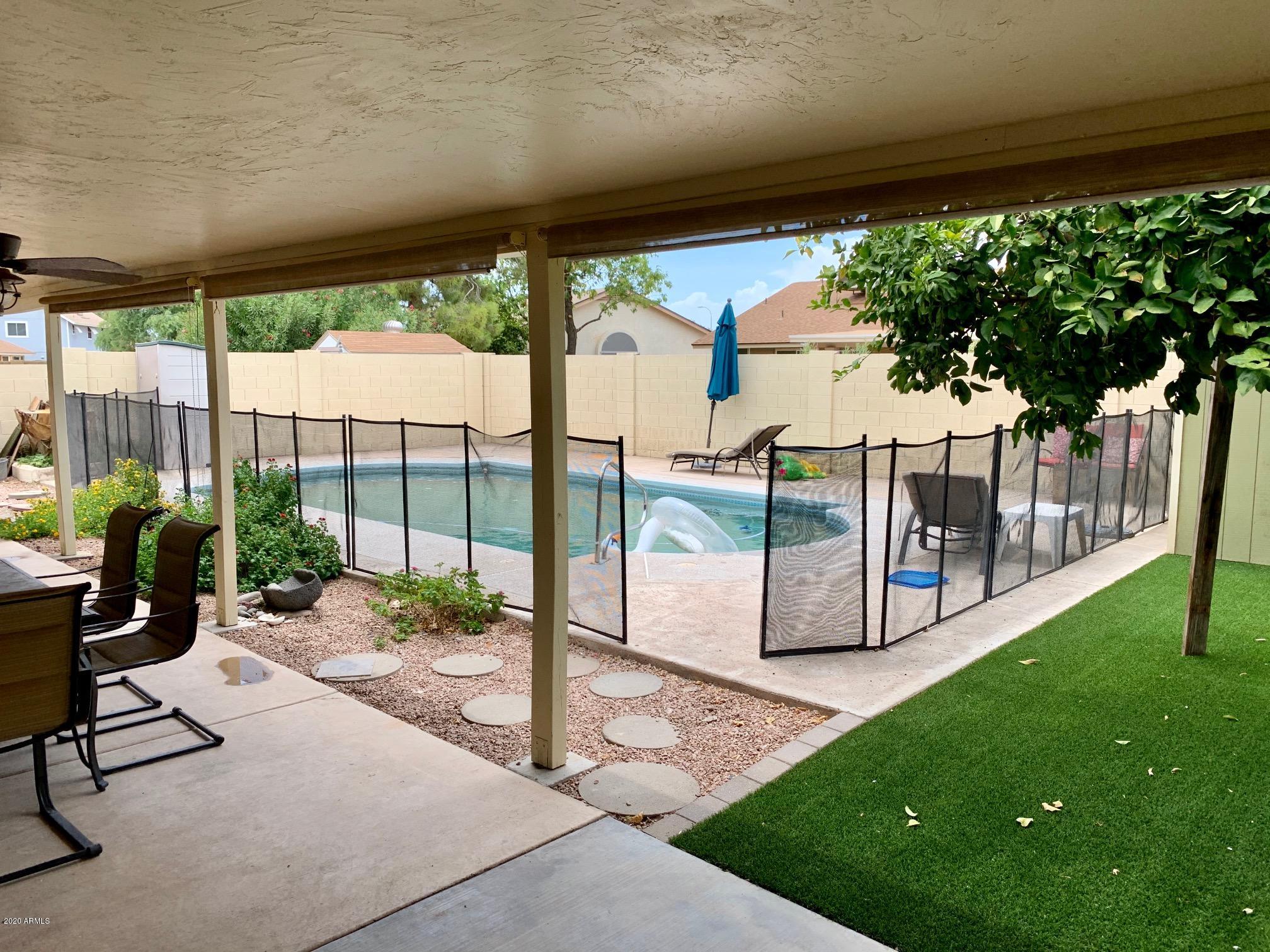 500 South Terrace Road Chandler, AZ 85226 - Photo 19 of 22 a view of a porch with chairs and backyard