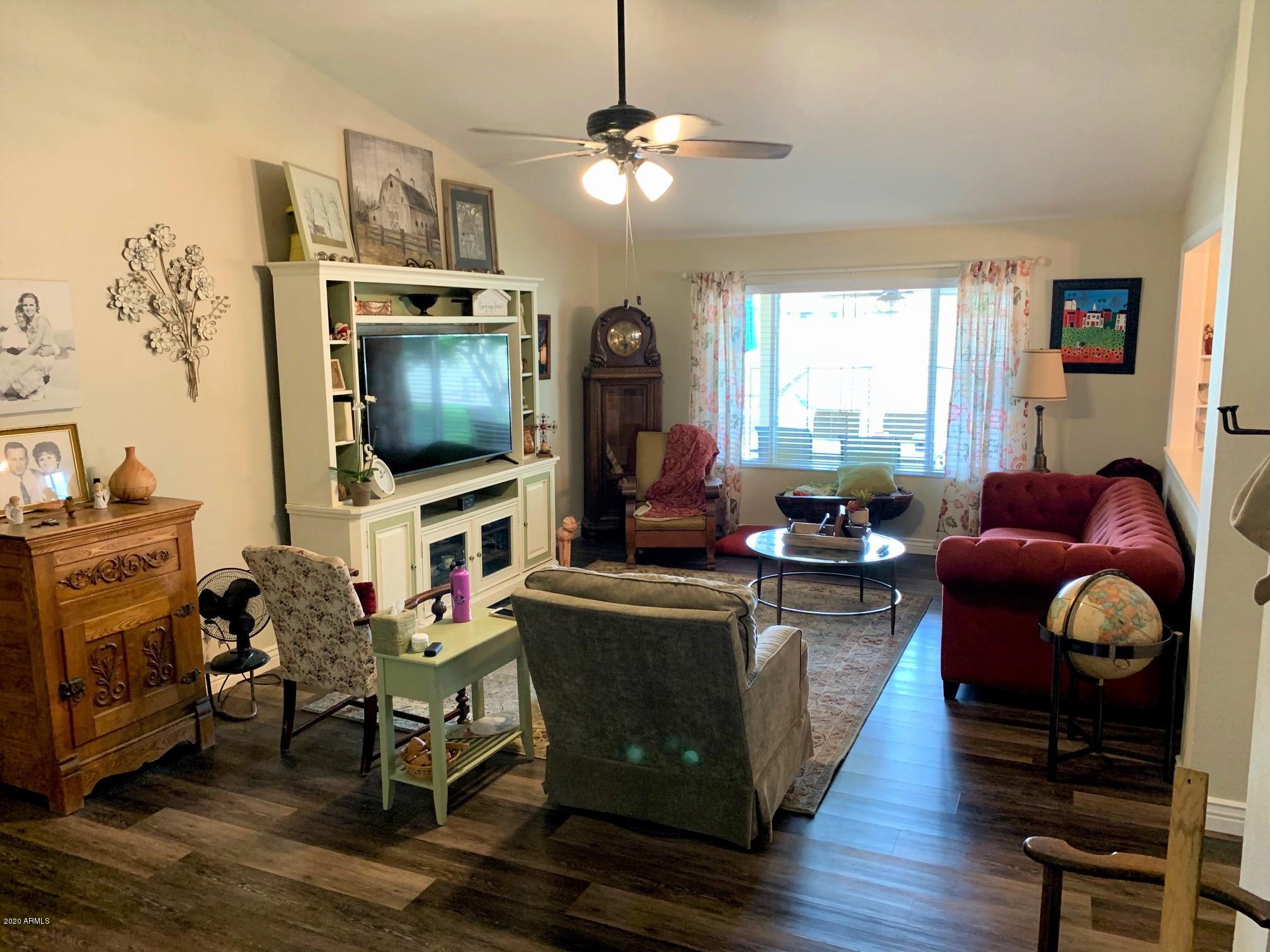 500 South Terrace Road Chandler, AZ 85226 - Photo 2 of 22 a living room with furniture and a flat screen tv