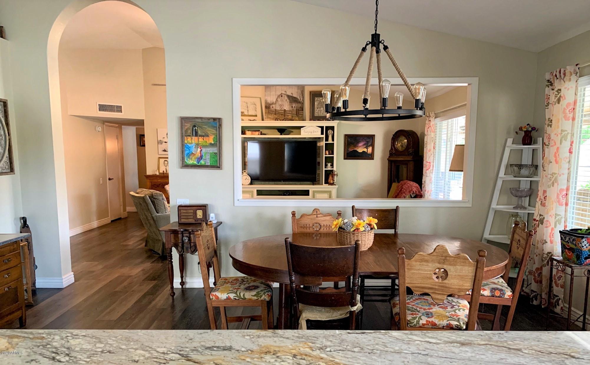 500 South Terrace Road Chandler, AZ 85226 - Photo 8 of 22 a living room with dining room and wooden floor