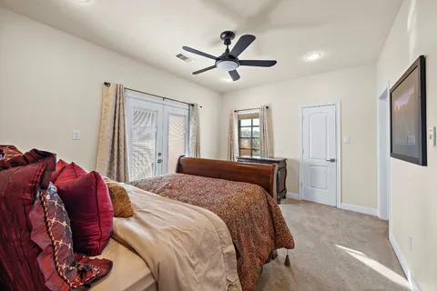 a bathroom with a double vanity sink and mirror