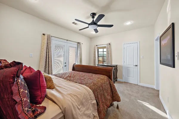 a bathroom with a double vanity sink and mirror