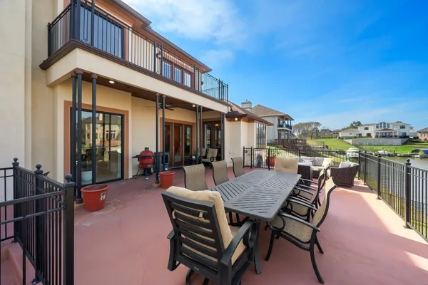 a view of a terrace with sitting area