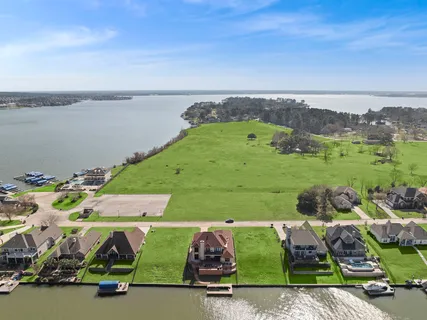 an aerial view of a houses with outdoor space