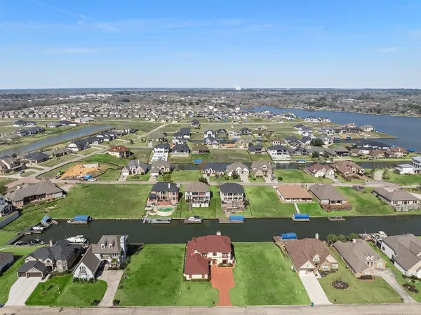 an aerial view of a city with lawn chairs