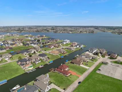 an aerial view of a city with lawn chairs