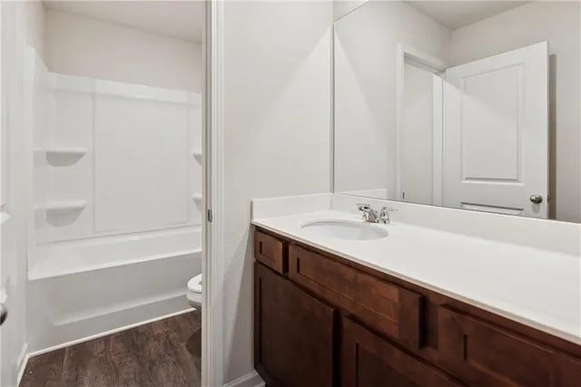 a bathroom with a sink and a bathtub