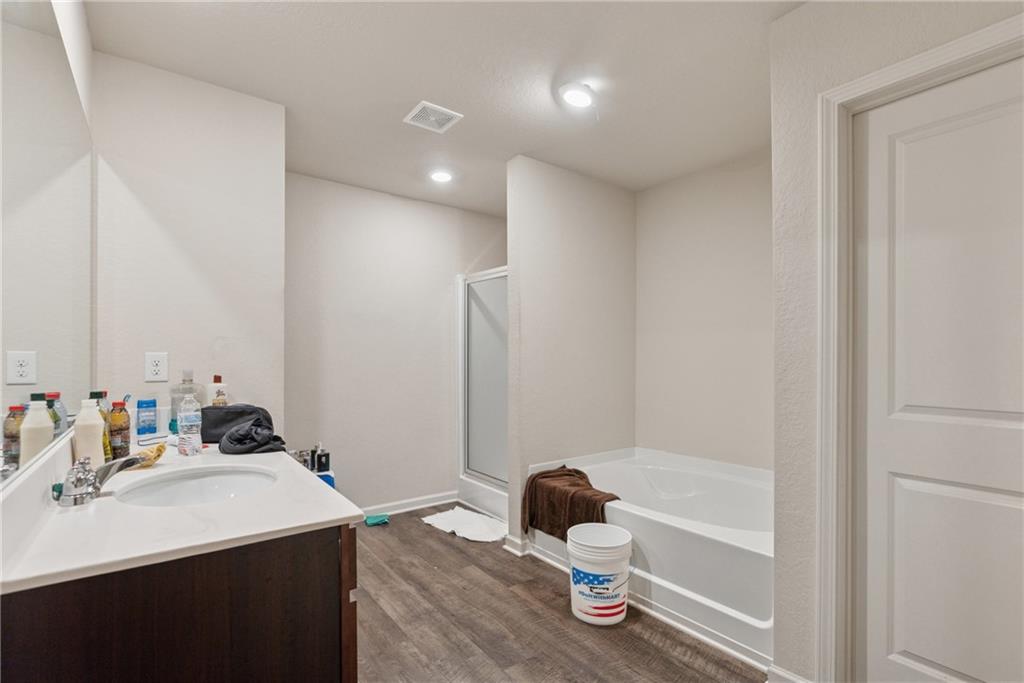 101 Foley Drive Cartersville, GA 30120 - Photo 17 of 24 a bathroom with a sink and a mirror