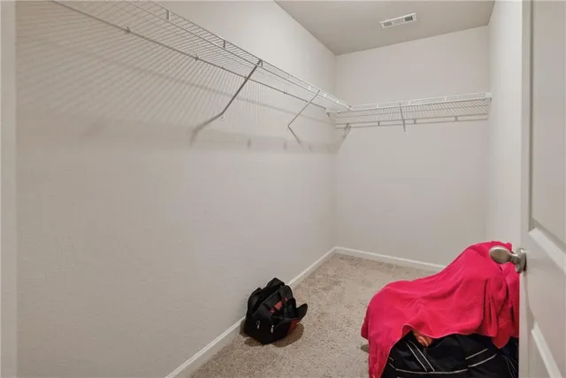 a room with a small car and a window