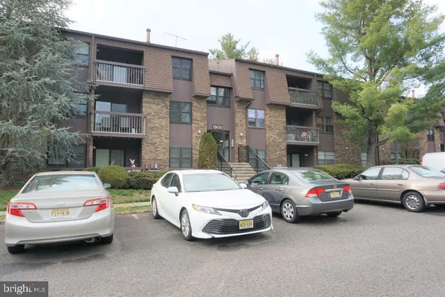 a car parked in front of a building