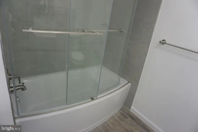 a bathroom with a bathtub