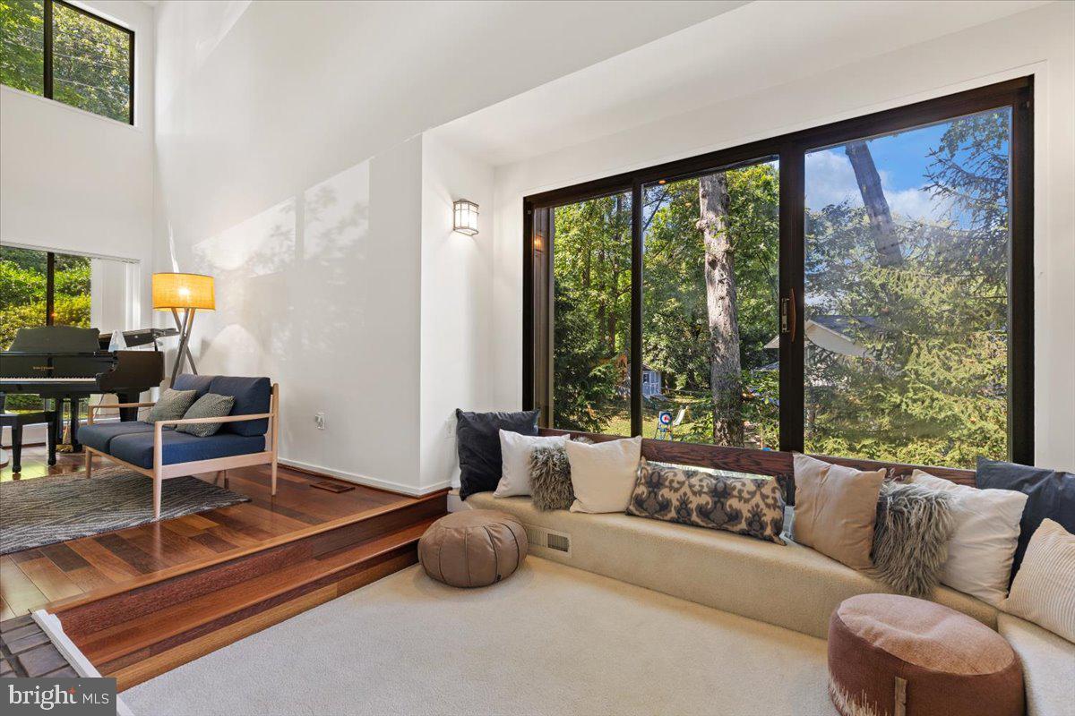 9411 Fernwood Road Bethesda, MD 20817 - Photo 11 of 101 a living room with furniture and a large window