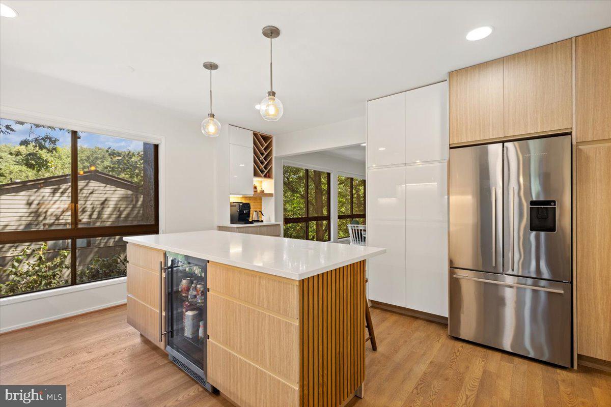 9411 Fernwood Road Bethesda, MD 20817 - Photo 20 of 101 a kitchen with stainless steel appliances granite countertop a refrigerator a sink and a stove
