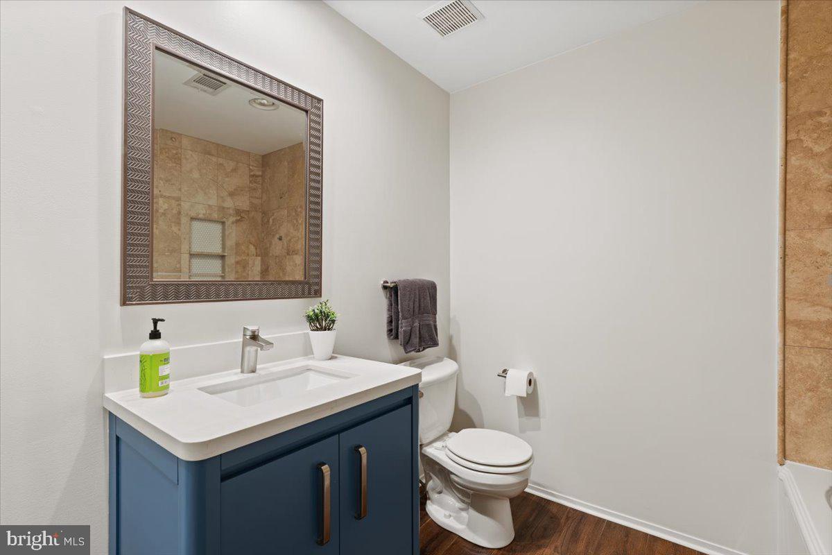9411 Fernwood Road Bethesda, MD 20817 - Photo 36 of 101 a bathroom with a sink and a toilet