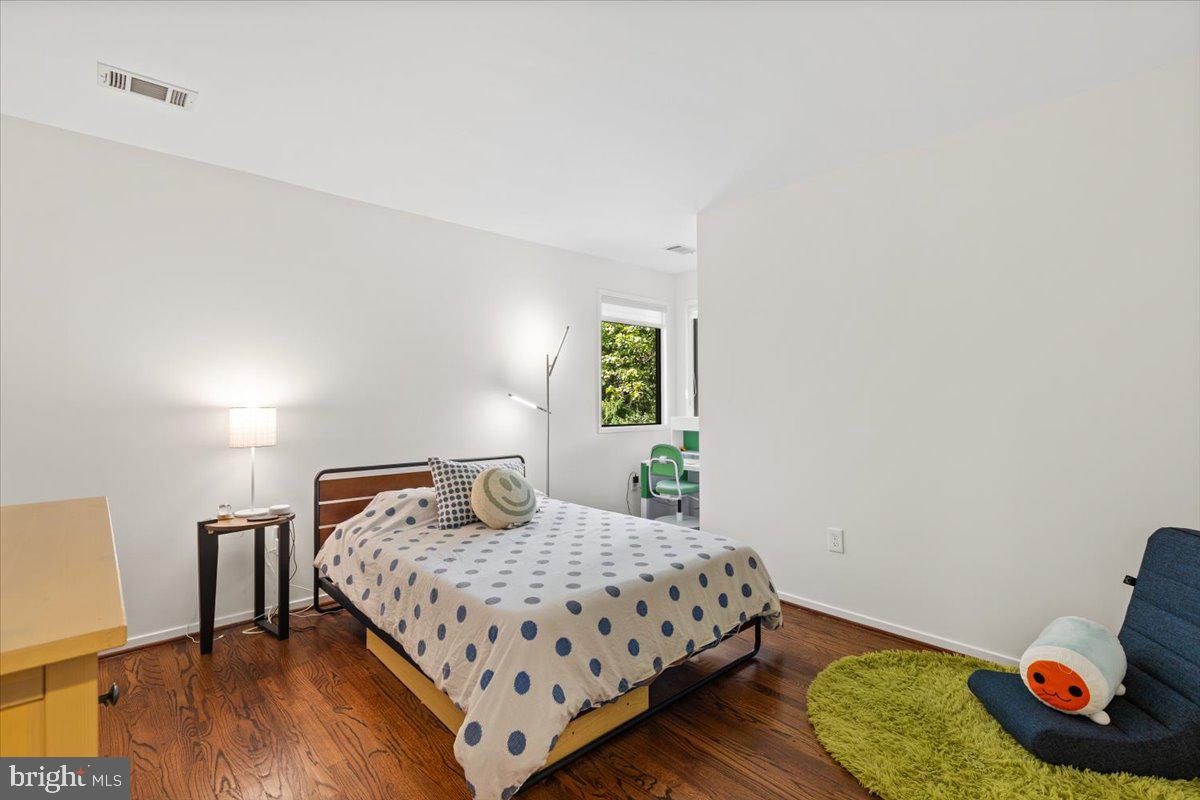 9411 Fernwood Road Bethesda, MD 20817 - Photo 41 of 101 a bedroom with a bed and a window