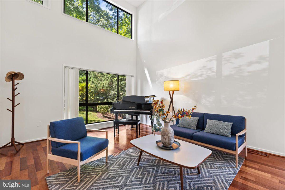 9411 Fernwood Road Bethesda, MD 20817 - Photo 7 of 101 a living room with furniture and a large window