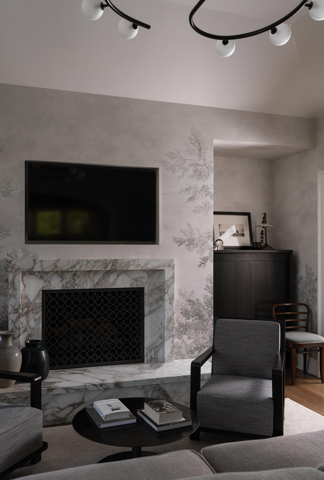 Undisclosed Address Montecito, CA 93108 - Photo 22 of 41 a living room with furniture a flat screen tv and a fireplace