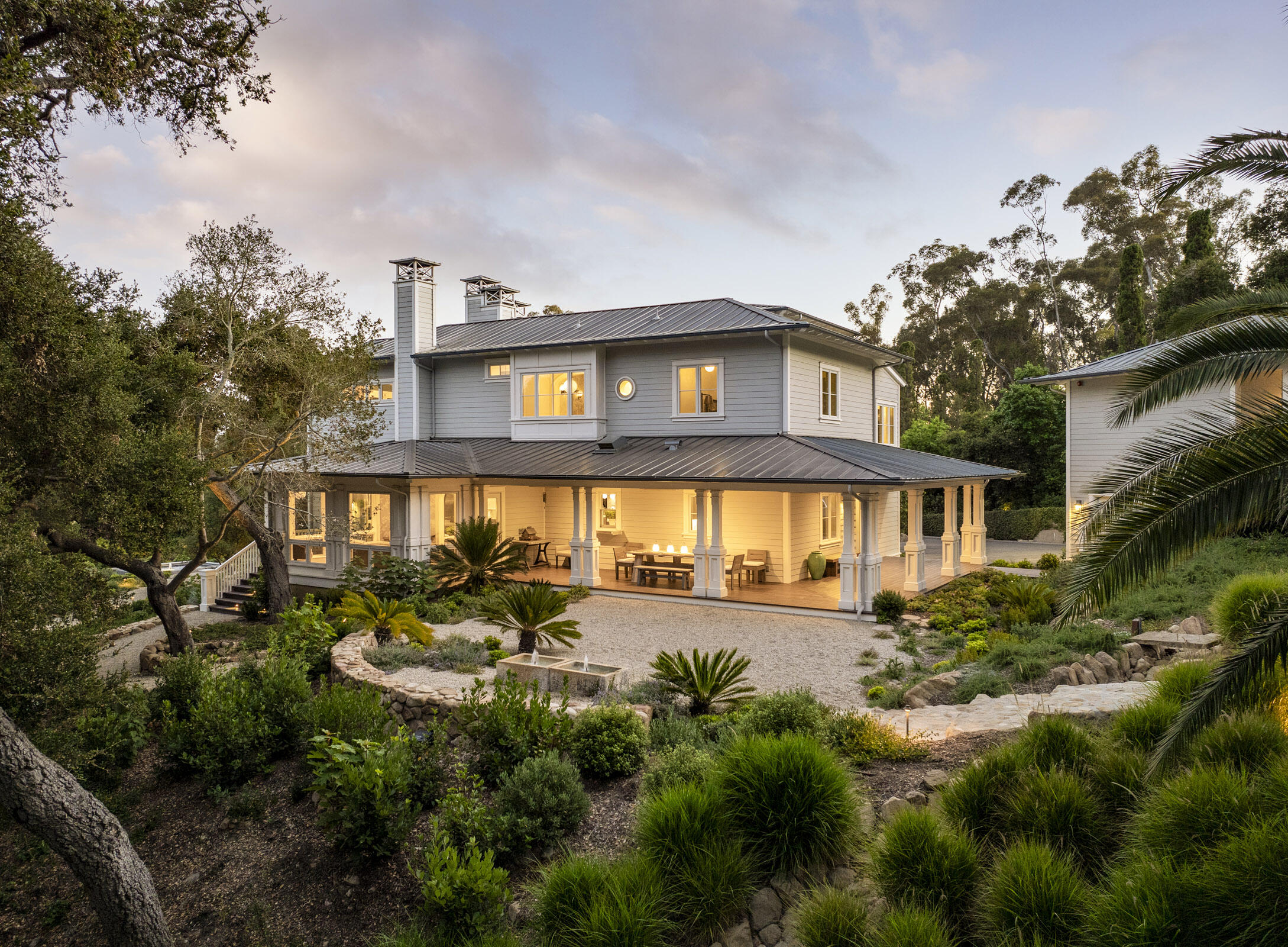 Undisclosed Address Montecito, CA 93108 - Photo 37 of 41 a view of a house with a small yard and plants