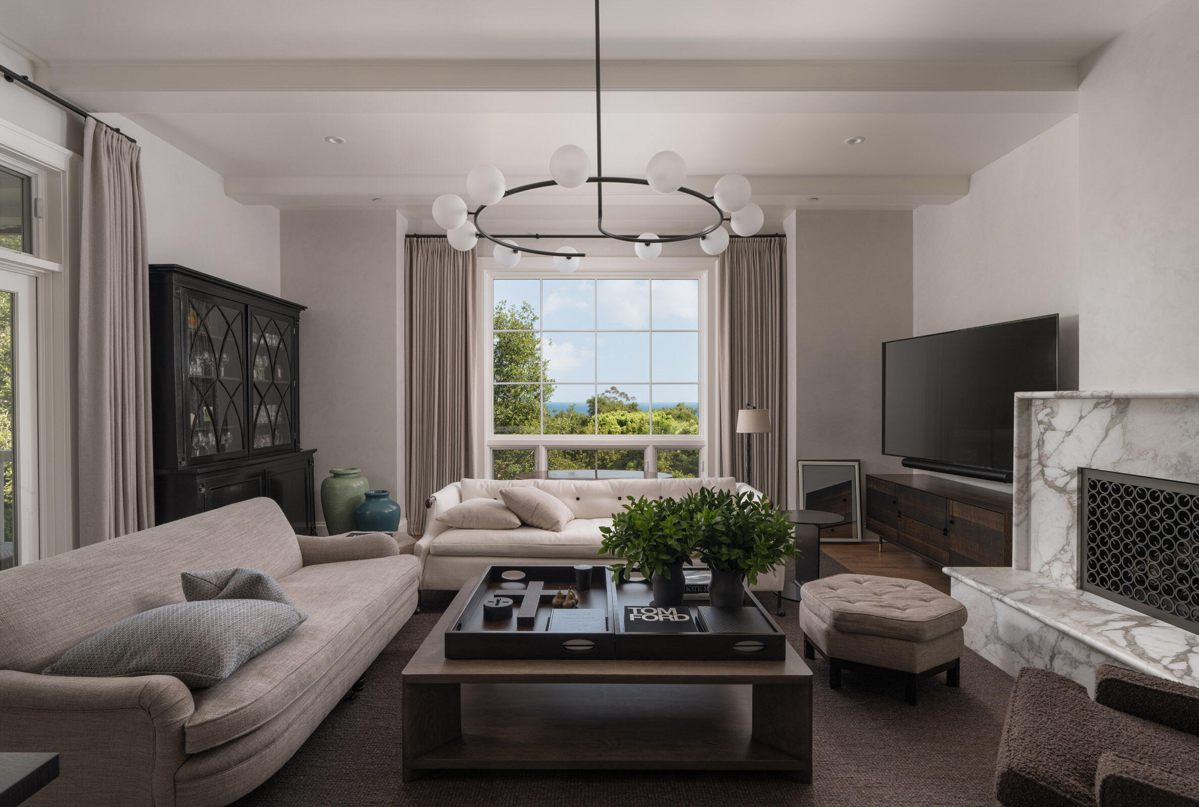 Undisclosed Address Montecito, CA 93108 - Photo 8 of 41 a living room with furniture a flat screen tv and a window