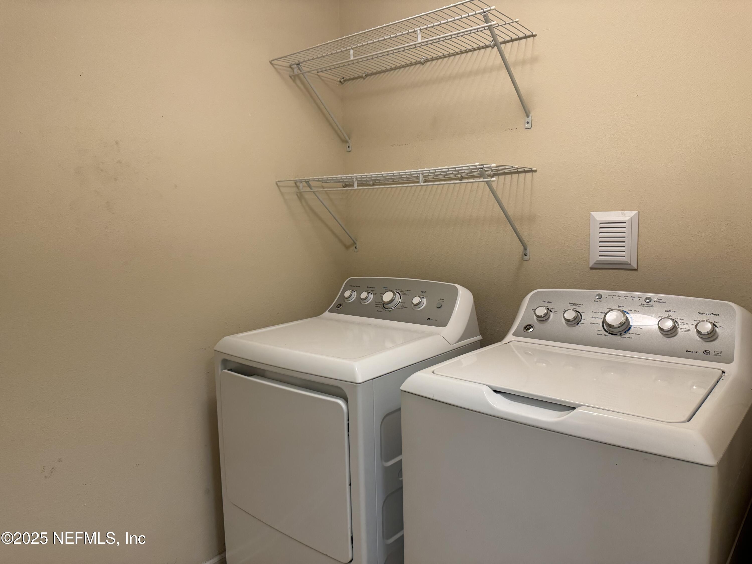 96 Midway Park Drive St. Augustine, FL 32084 - Photo 22 of 31 a utility room with dryer and washer