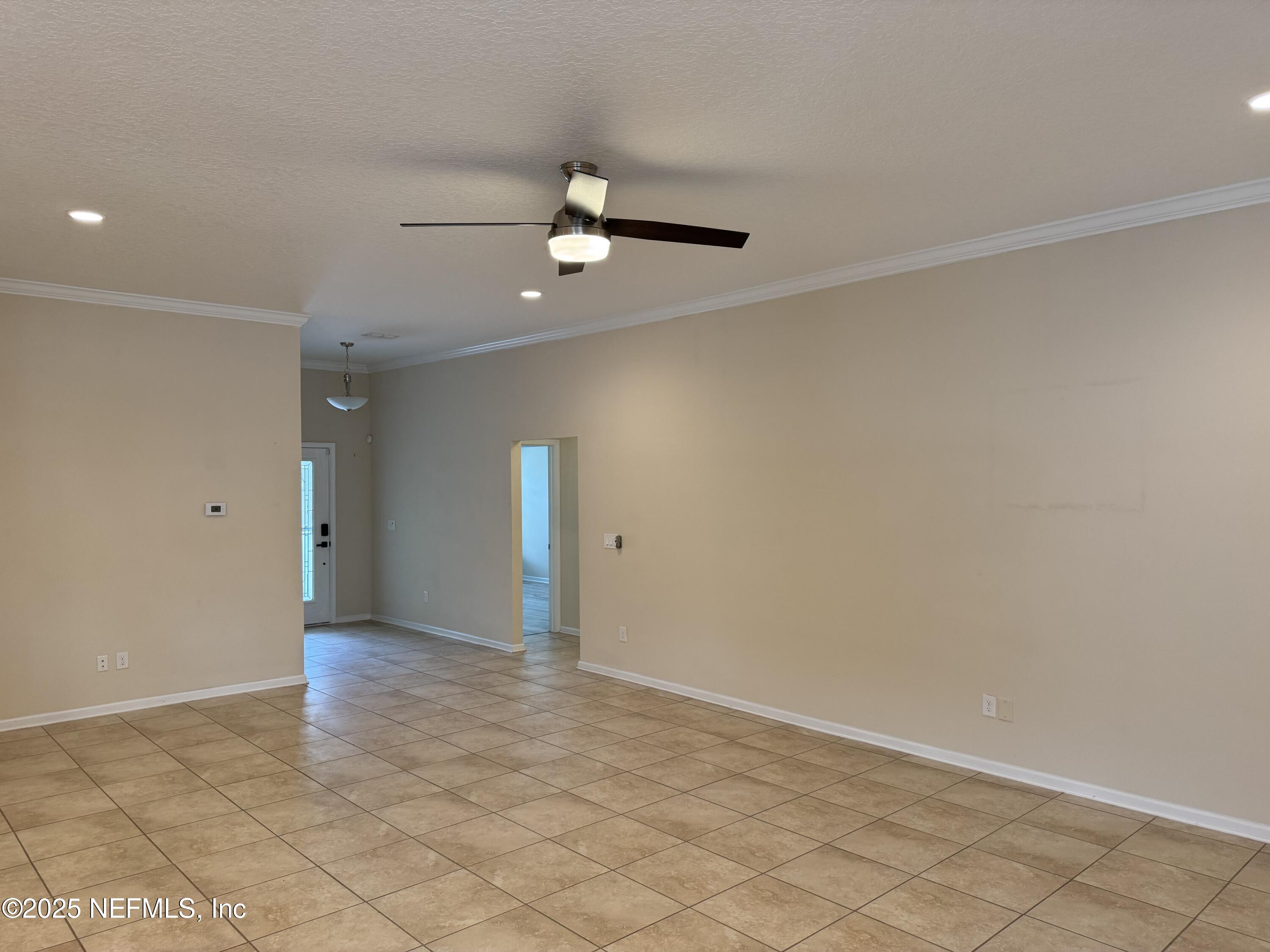 96 Midway Park Drive St. Augustine, FL 32084 - Photo 5 of 31 wooden floor in an empty room