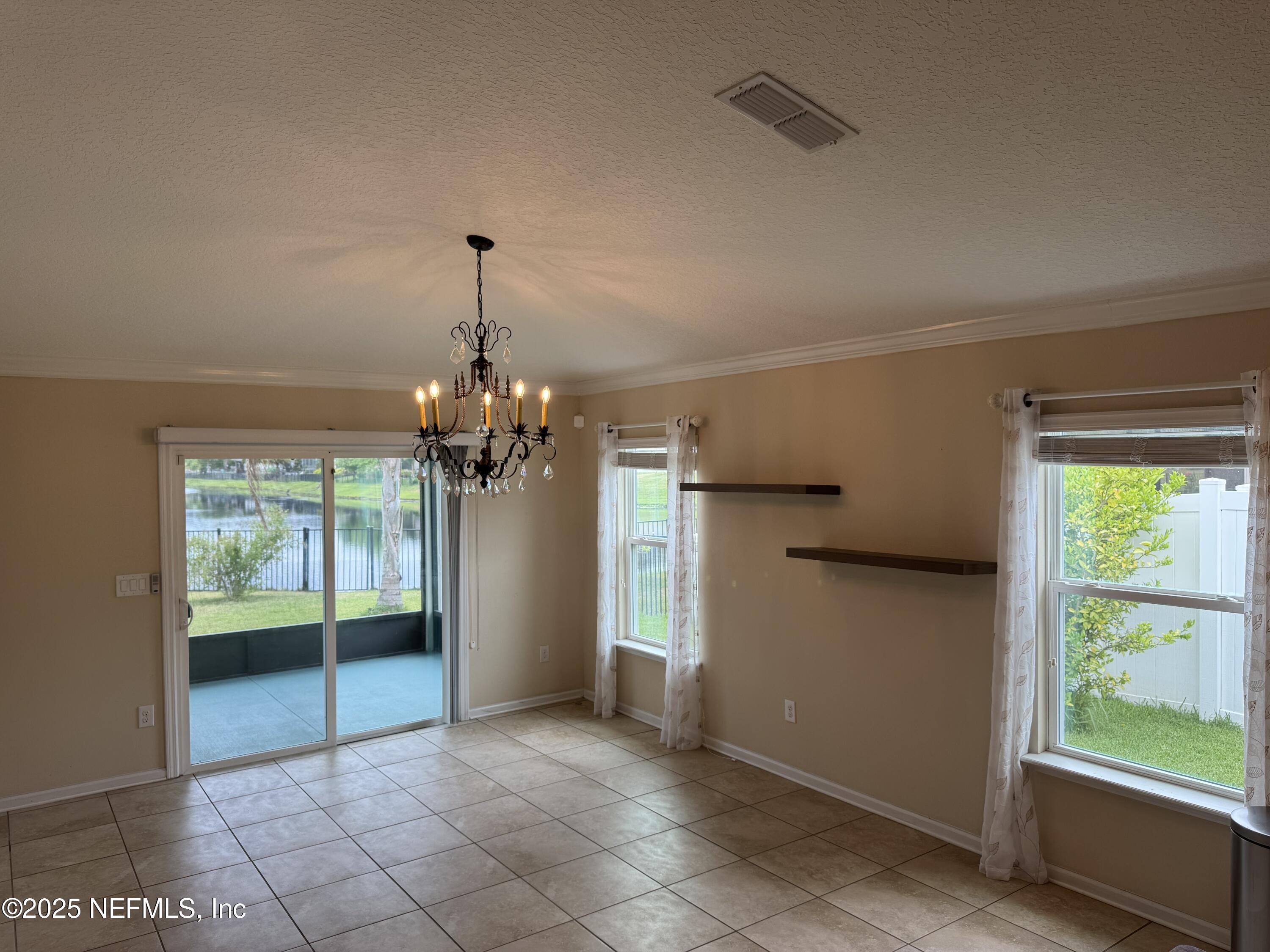 96 Midway Park Drive St. Augustine, FL 32084 - Photo 7 of 31 a view of a room with window and stairs