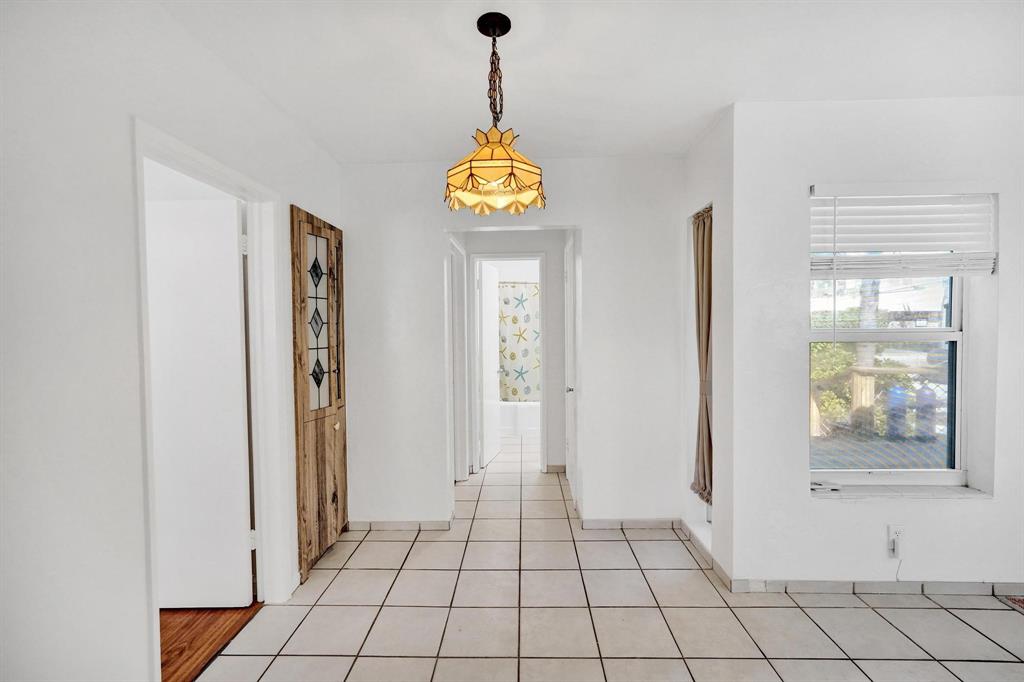 326 Madison Street, Unit 2 Hollywood, FL 33019 - Photo 13 of 27 a view of an entryway with wooden floor