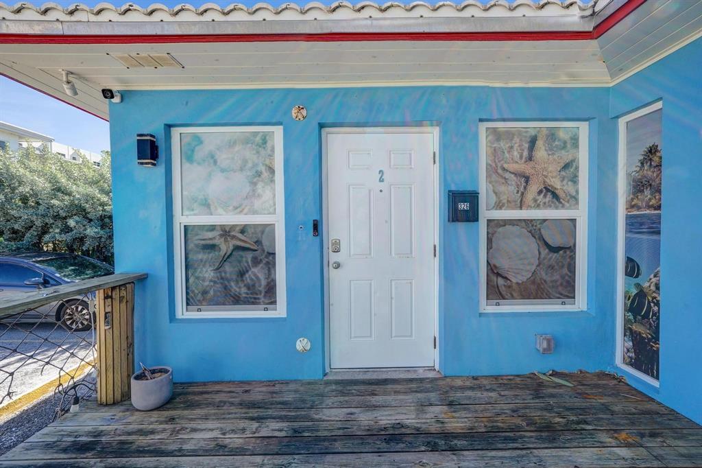 326 Madison Street, Unit 2 Hollywood, FL 33019 - Photo 3 of 27 a view of entryway with wooden floor