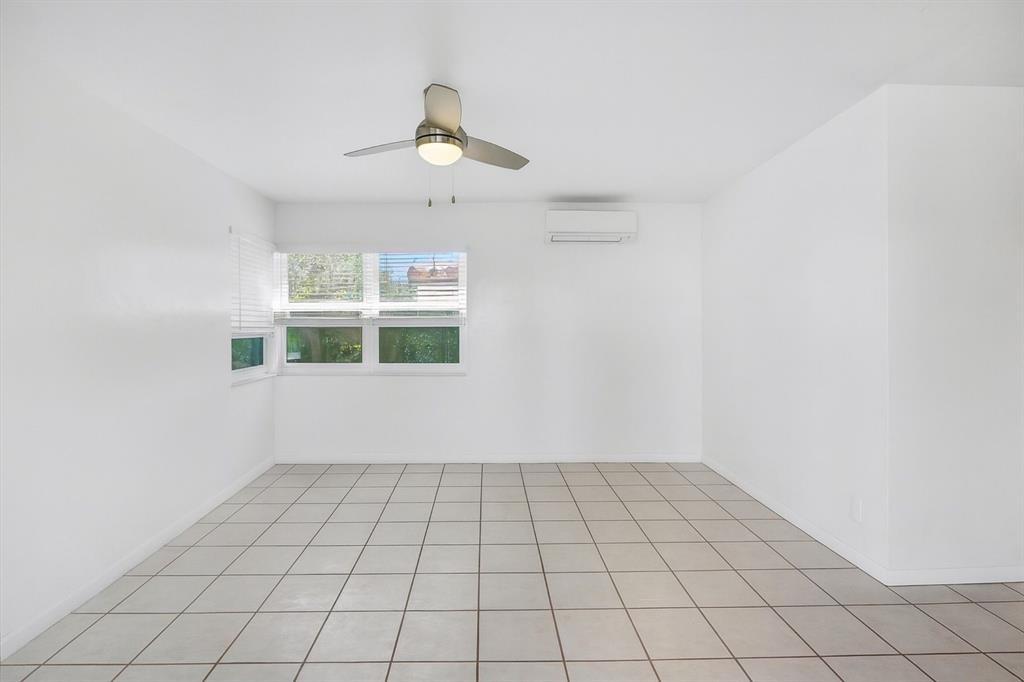 326 Madison Street, Unit 2 Hollywood, FL 33019 - Photo 6 of 27 a view of an empty room and window