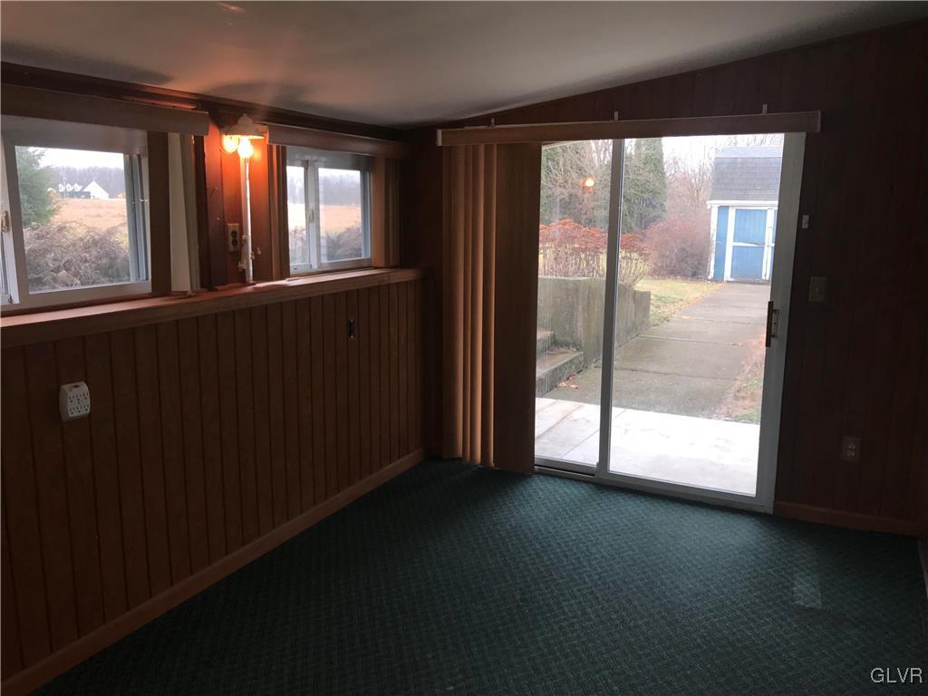 567 Georgetown Road Nazareth, PA 18064 - Photo 8 of 21 Sliding glass doors off four seasons room leading