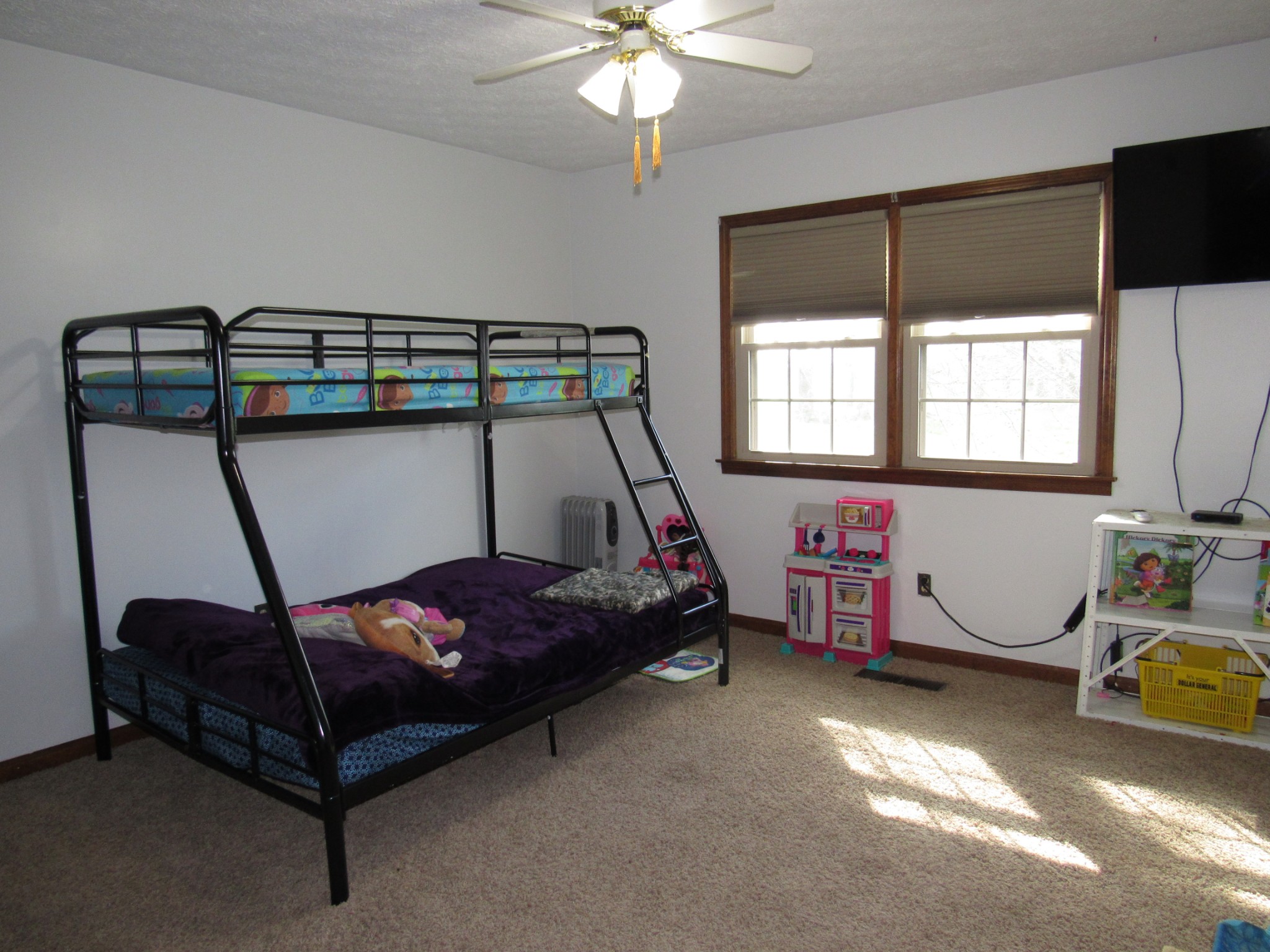 11885 Palmyra Road Oak Grove, KY 42262 - Photo 15 of 21 a bedroom with a bed and a chandelier