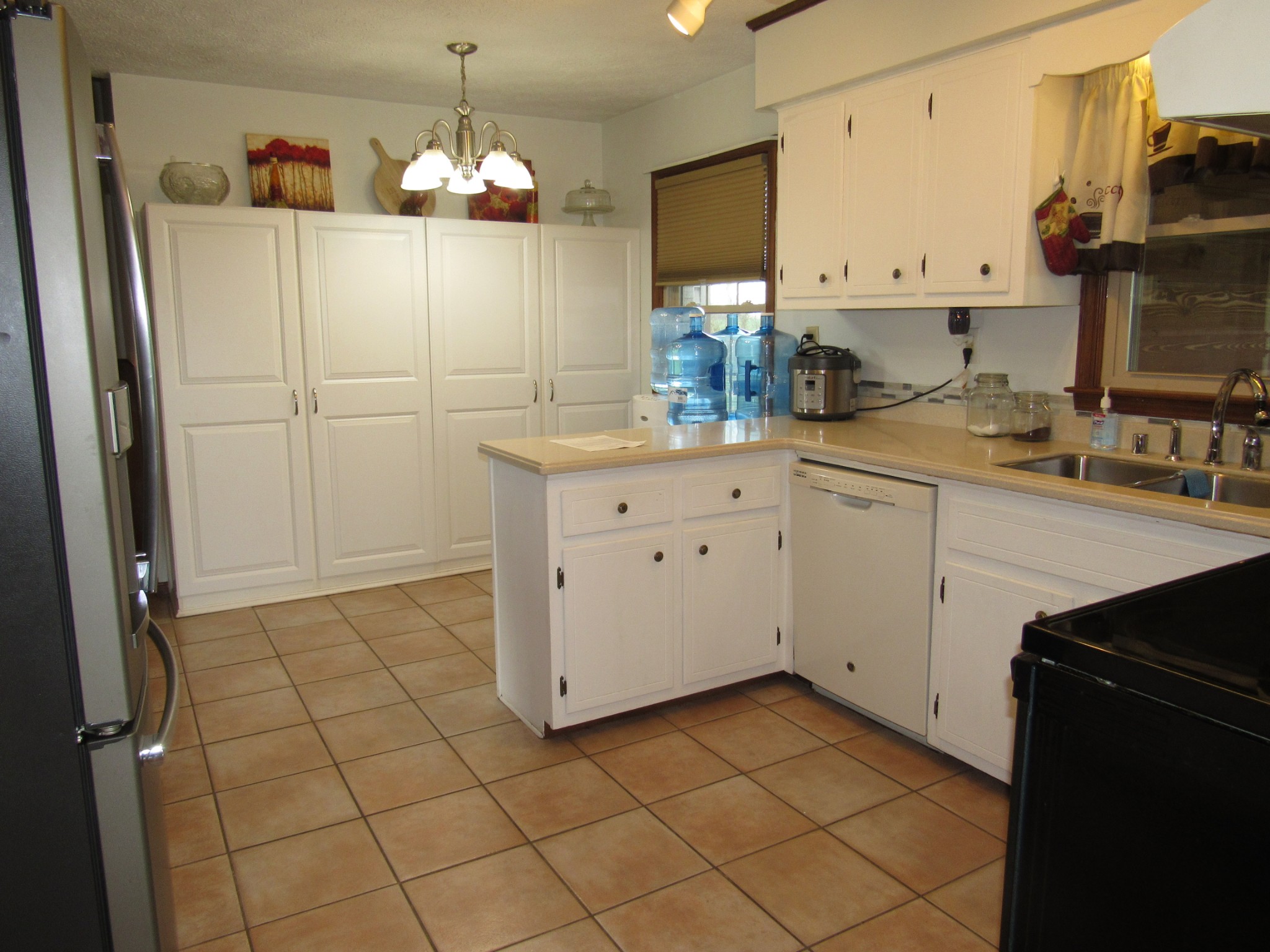 11885 Palmyra Road Oak Grove, KY 42262 - Photo 6 of 21 a kitchen with a sink cabinets and appliances