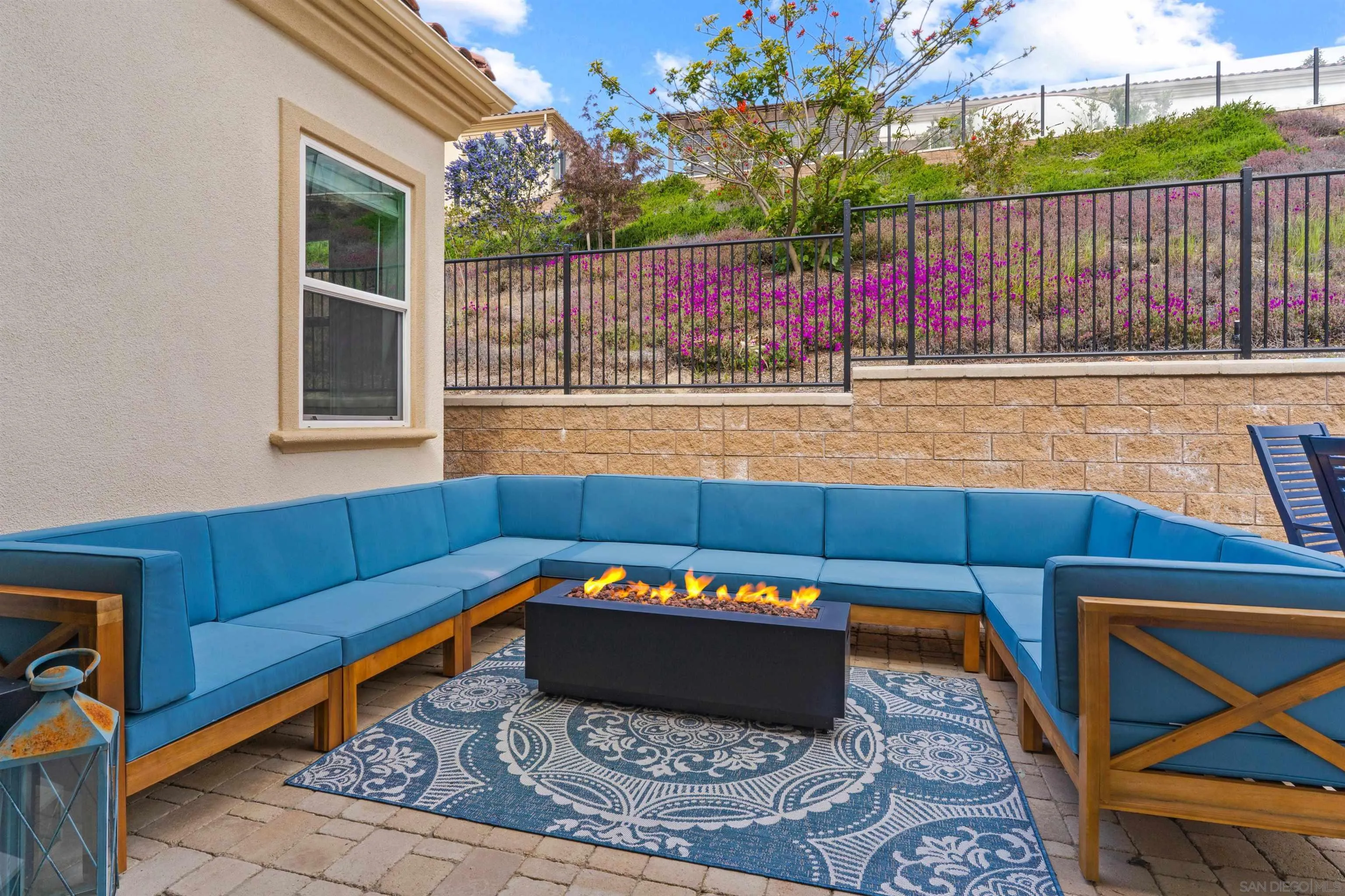 2520 Wellspring Street Carlsbad, CA 92010 - Photo 20 of 26 a view of a backyard with a large tree