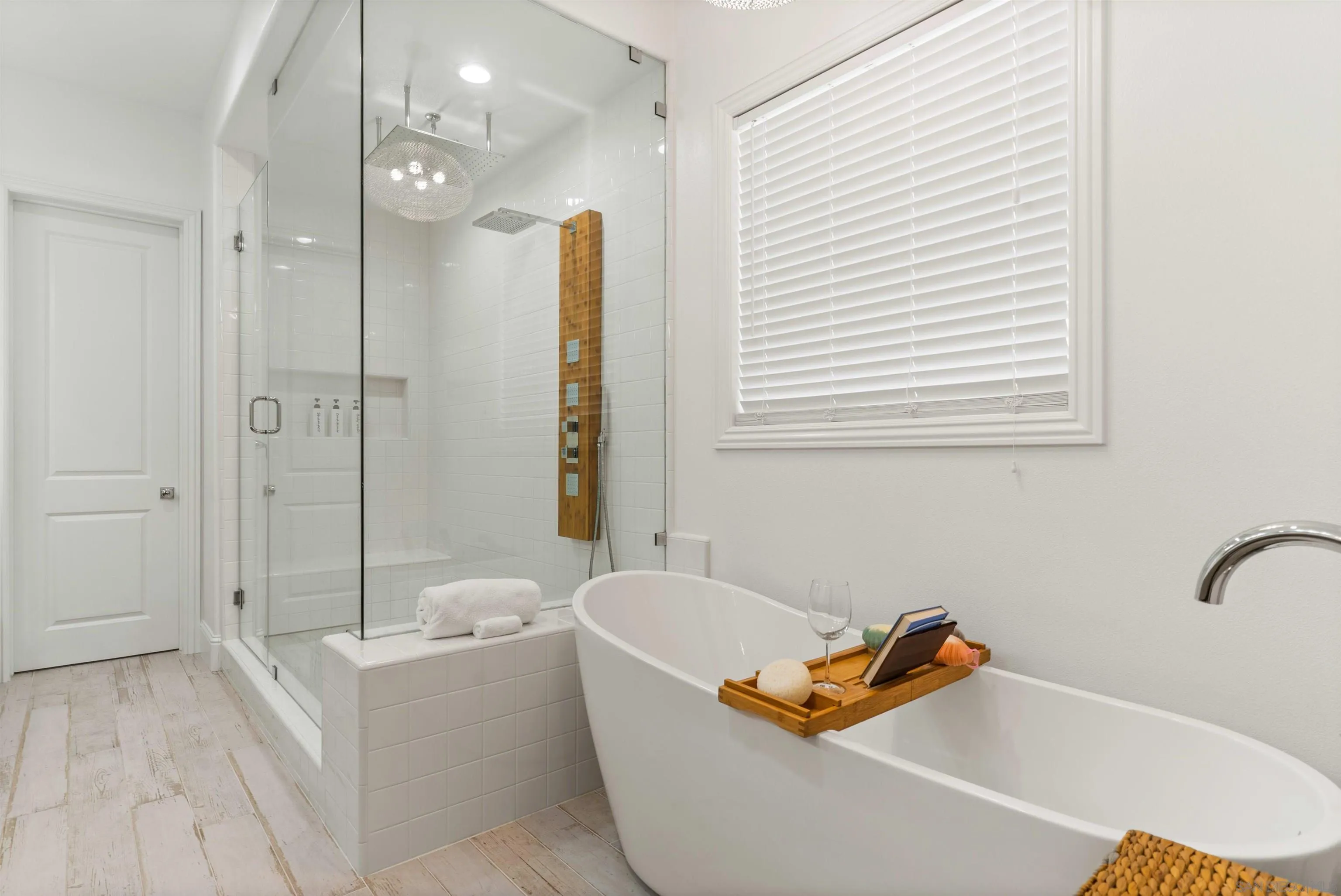 2520 Wellspring Street Carlsbad, CA 92010 - Photo 6 of 26 a bathroom with a tub a sink and a shower