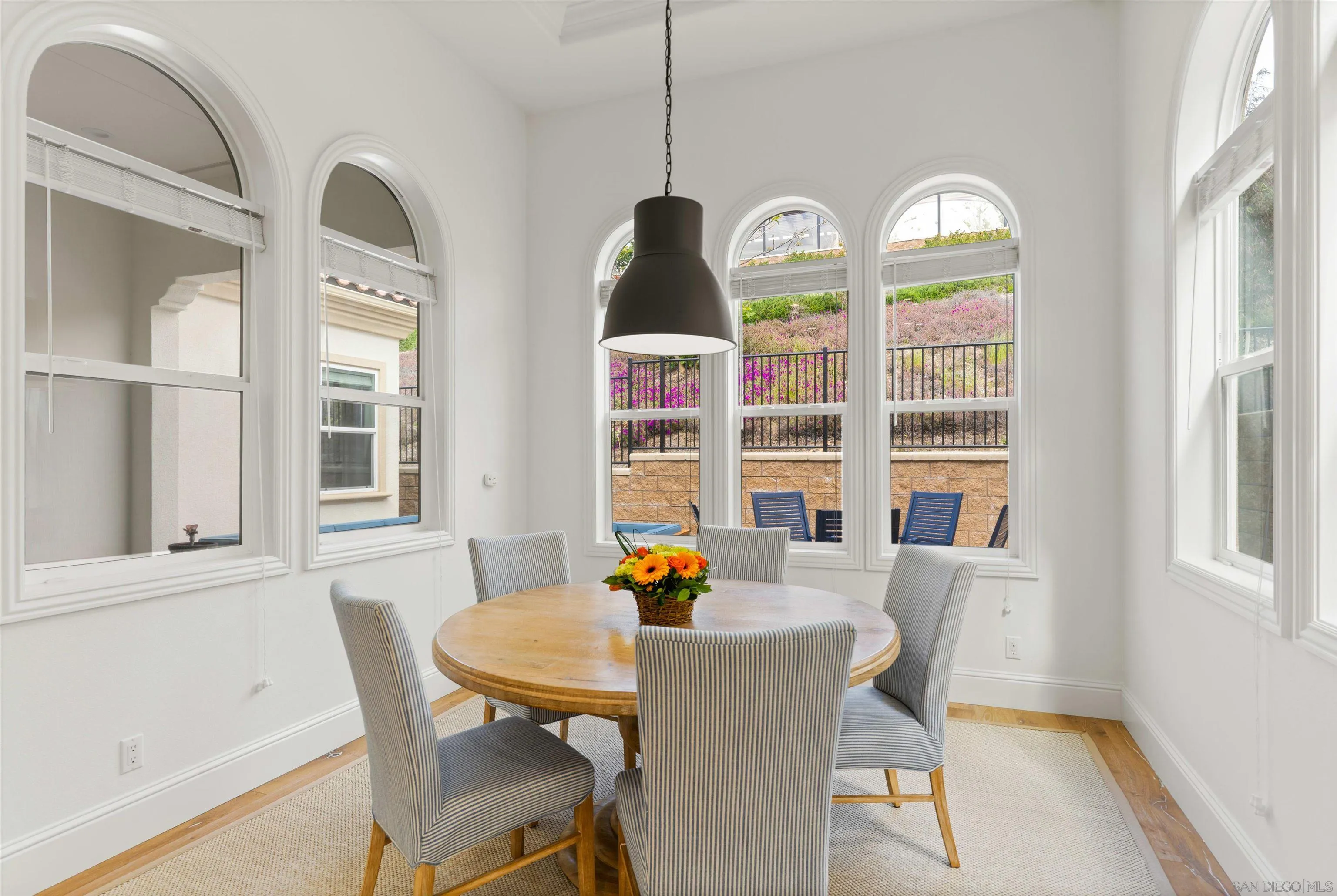 2520 Wellspring Street Carlsbad, CA 92010 - Photo 9 of 26 a view of a dining room with furniture window and outside view