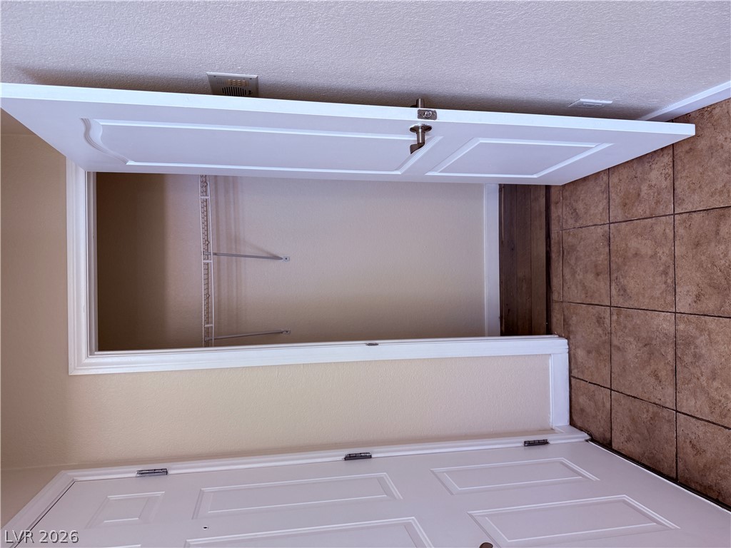 9325 West Desert Inn Road, Unit 260 Las Vegas, NV 89117 - Photo 18 of 42 Ample storage space with practical shelving, offering functional organization.
