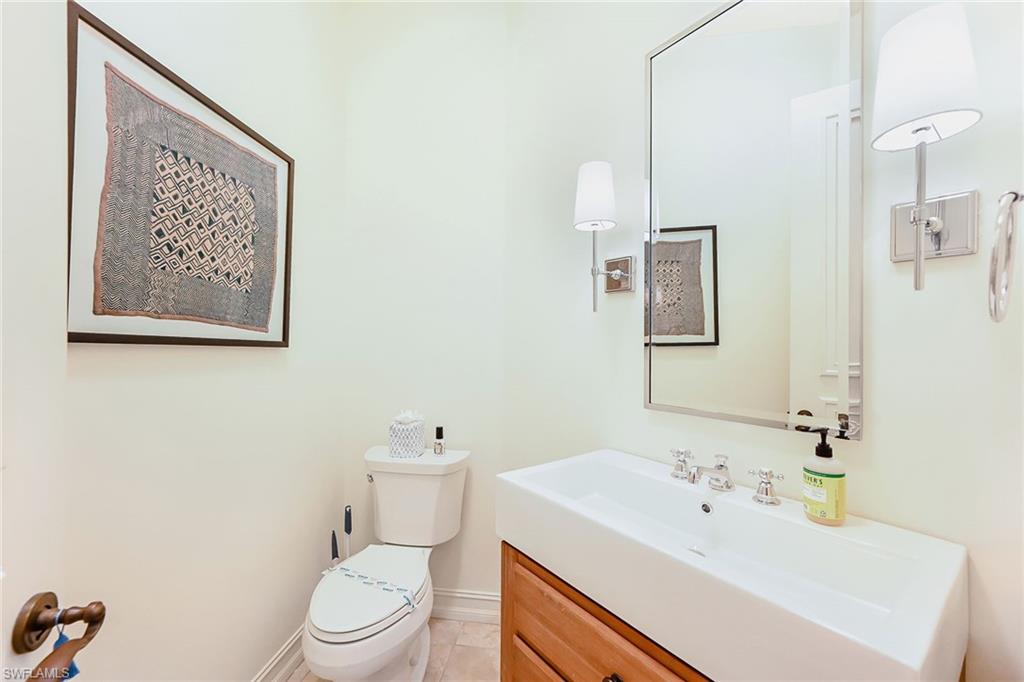 9155 Torrefino Court Naples, FL 34109 - Photo 11 of 28 1st Floor Half/Pool Bath