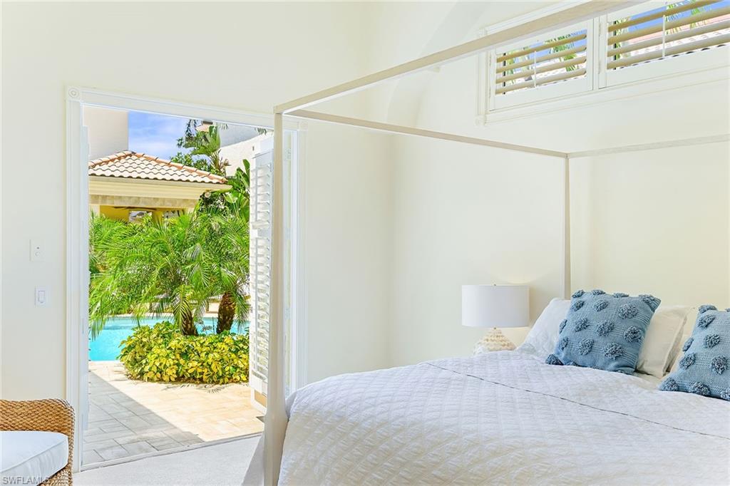 9155 Torrefino Court Naples, FL 34109 - Photo 12 of 28 Primary Bedroom