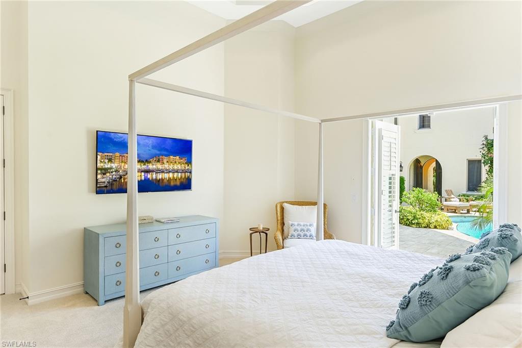 9155 Torrefino Court Naples, FL 34109 - Photo 13 of 28 Primary Bedroom