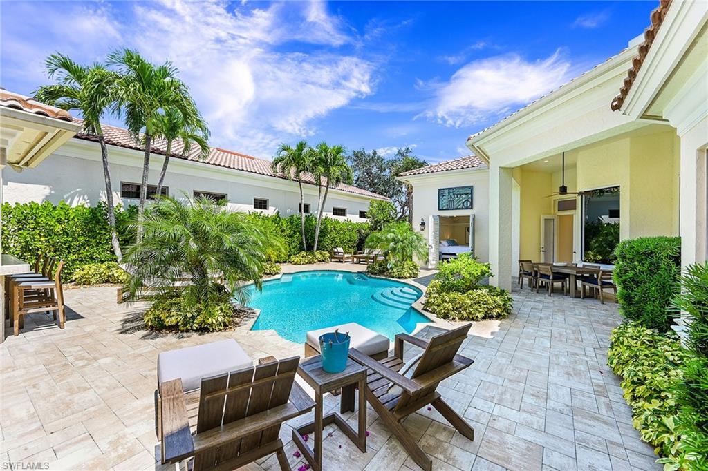9155 Torrefino Court Naples, FL 34109 - Photo 27 of 28 Heated Courtyard Pool