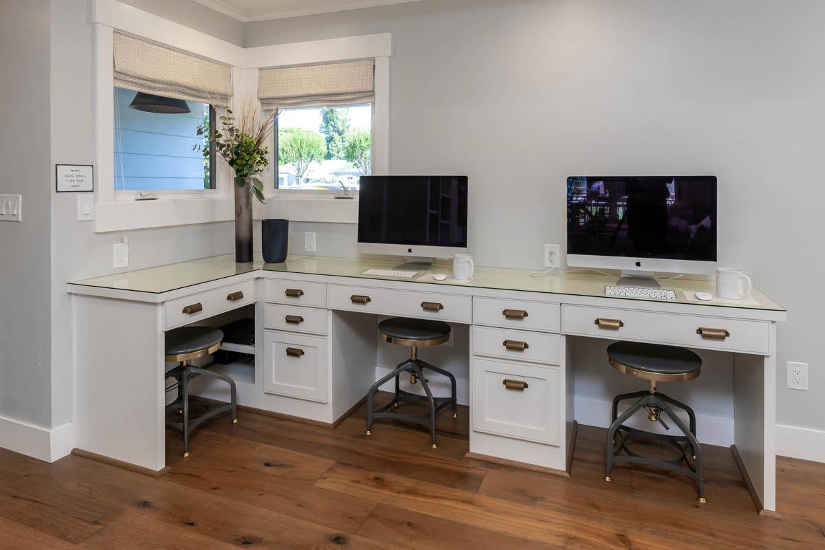1489 Brookmill Road Los Altos, CA 94024 - Photo 16 of 43 a view of a workspace with furniture and a flat screen tv