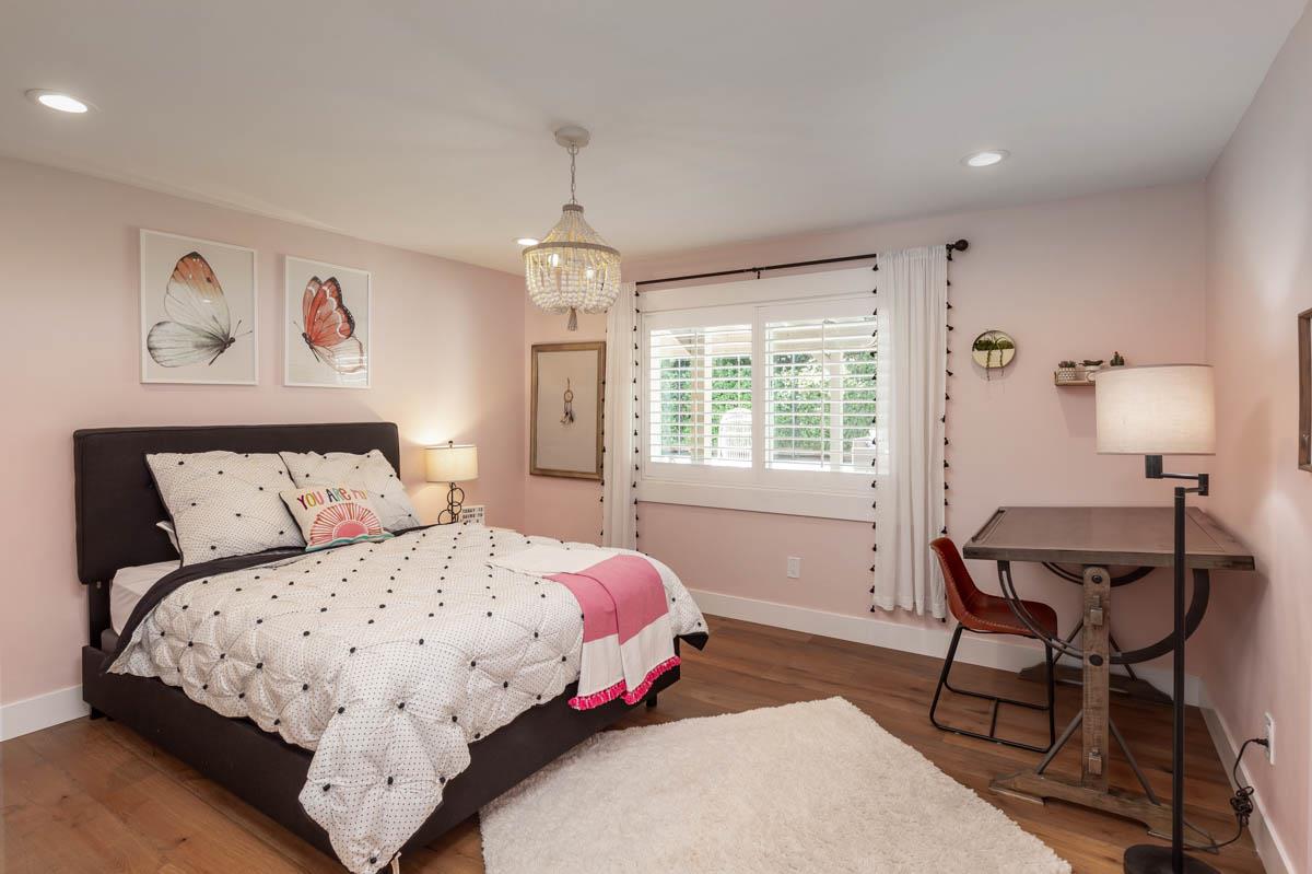 1489 Brookmill Road Los Altos, CA 94024 - Photo 22 of 43 a bedroom with a bed and a table