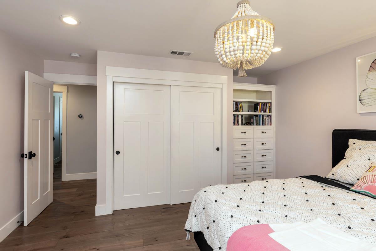 1489 Brookmill Road Los Altos, CA 94024 - Photo 23 of 43 a bedroom with a bed and wooden floor