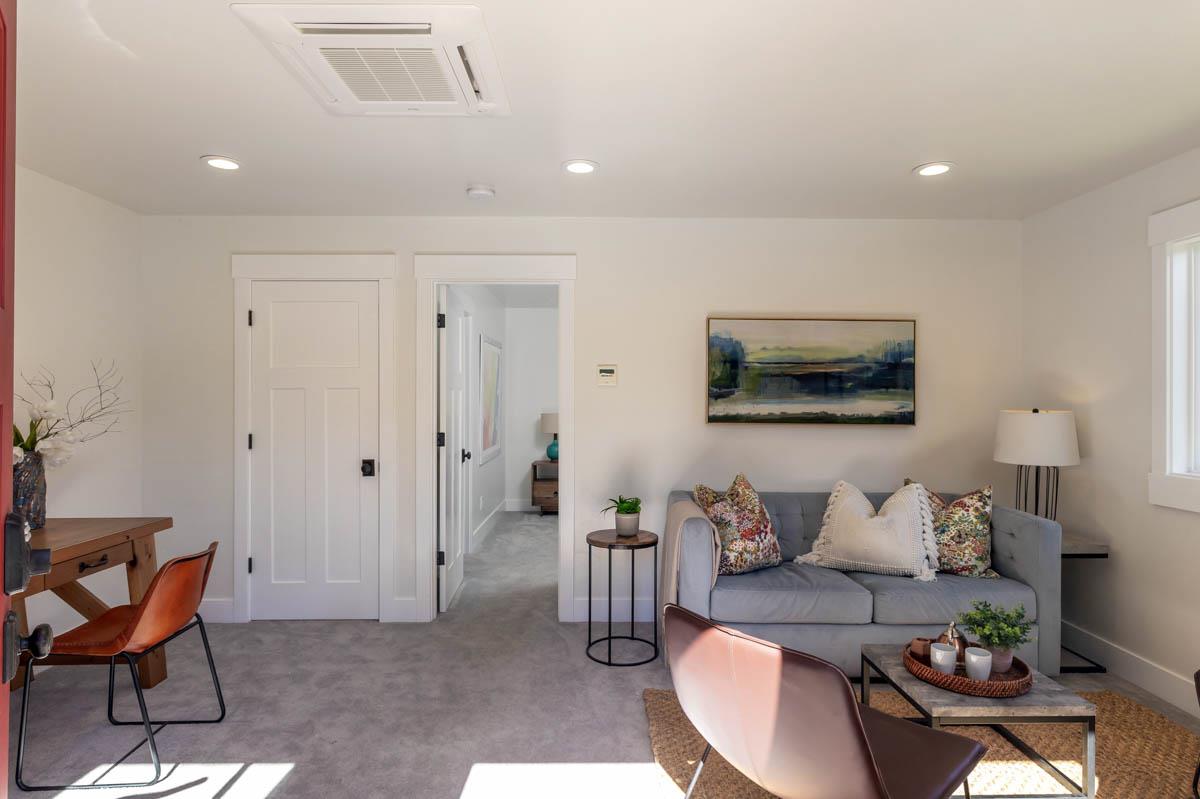 1489 Brookmill Road Los Altos, CA 94024 - Photo 38 of 43 a living room with furniture and a painting on the wall