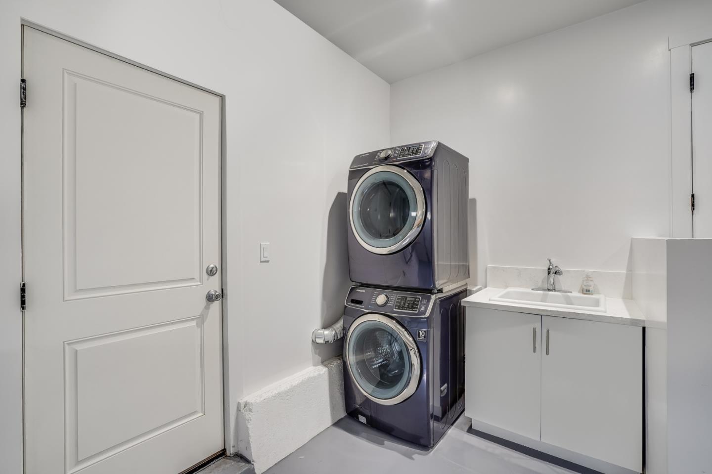 646 Brighton Road Pacifica, CA 94044 - Photo 24 of 26 a utility room with sink dryer and washer