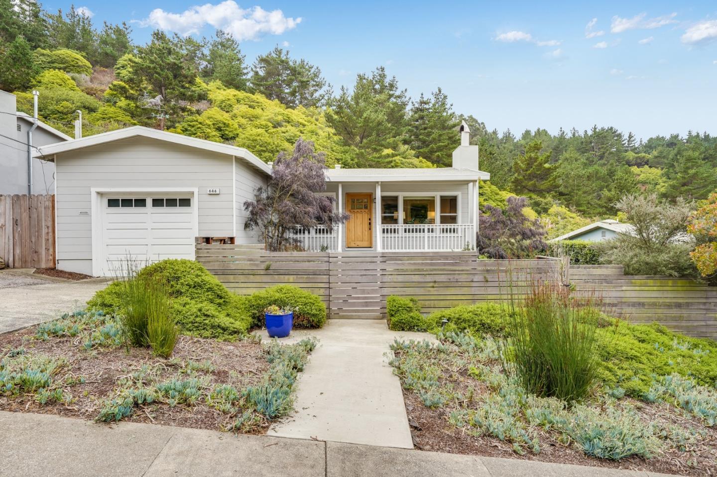 646 Brighton Road Pacifica, CA 94044 - Photo 26 of 26 a front view of a house with a yard