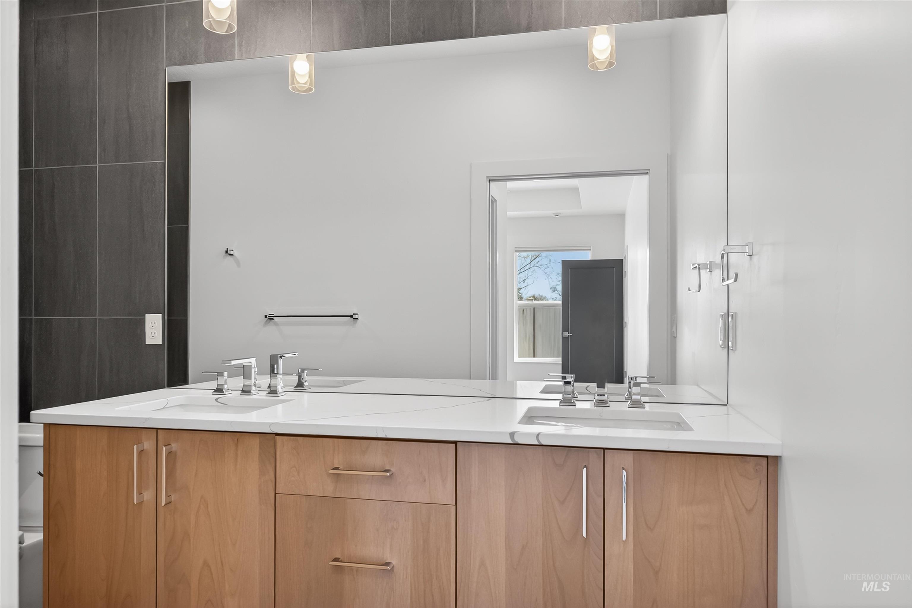 3710 22nd Street Lewiston, ID 83501 - Photo 28 of 36 Bathroom with double vanity and toilet