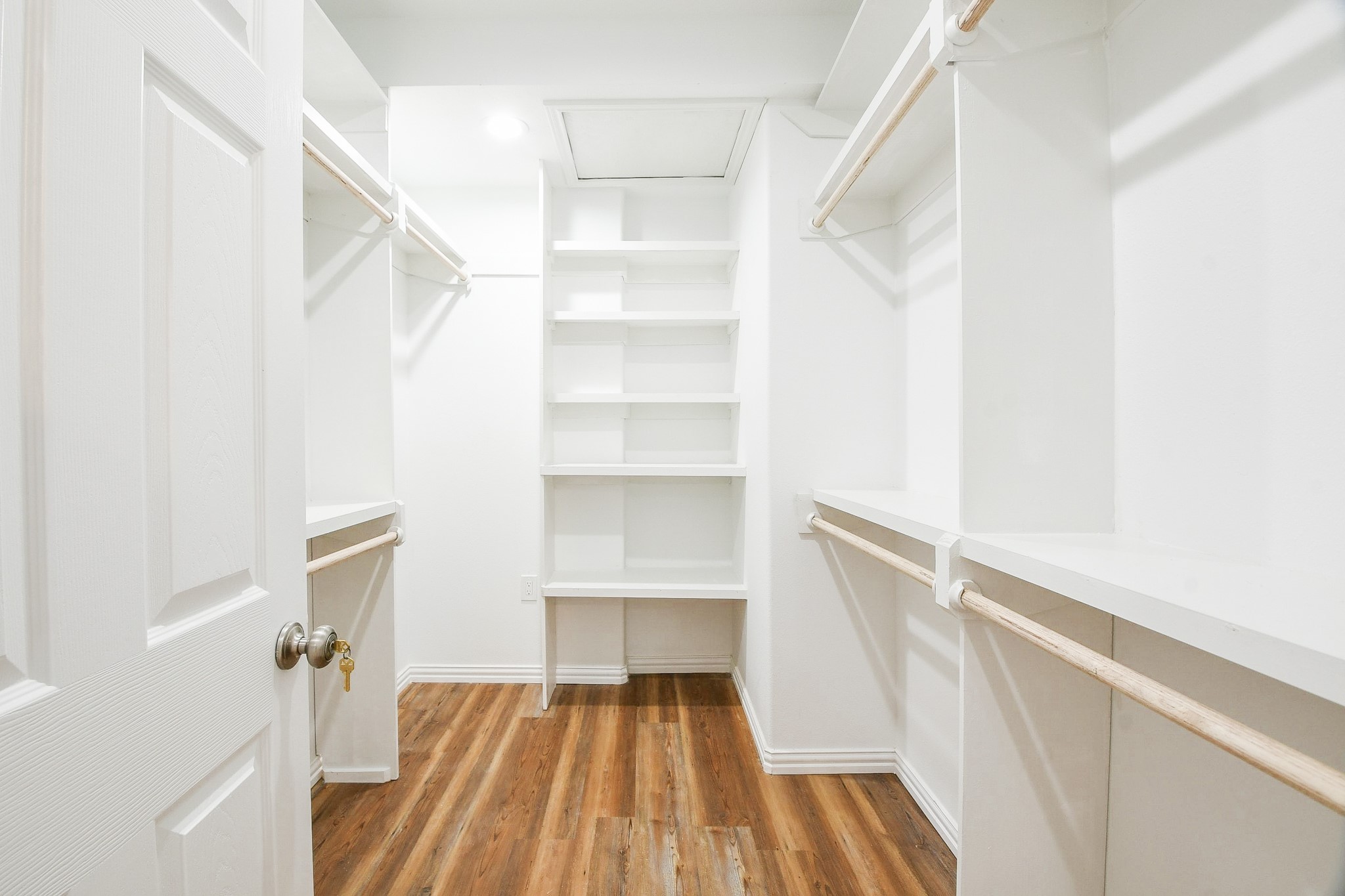 3200 Hoover Street La Marque, TX 77568 - Photo 11 of 31 a view of walk in closet with empty racks