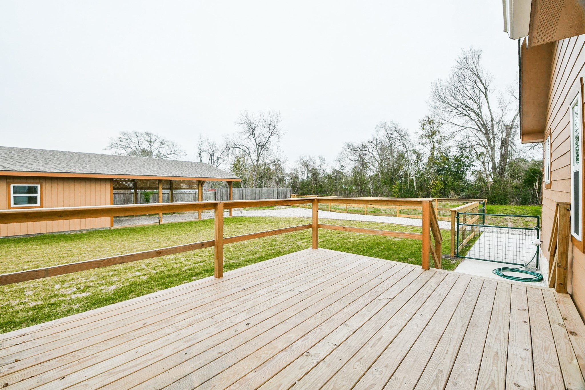 3200 Hoover Street La Marque, TX 77568 - Photo 19 of 31 a view of balcony with deck and wooden floor